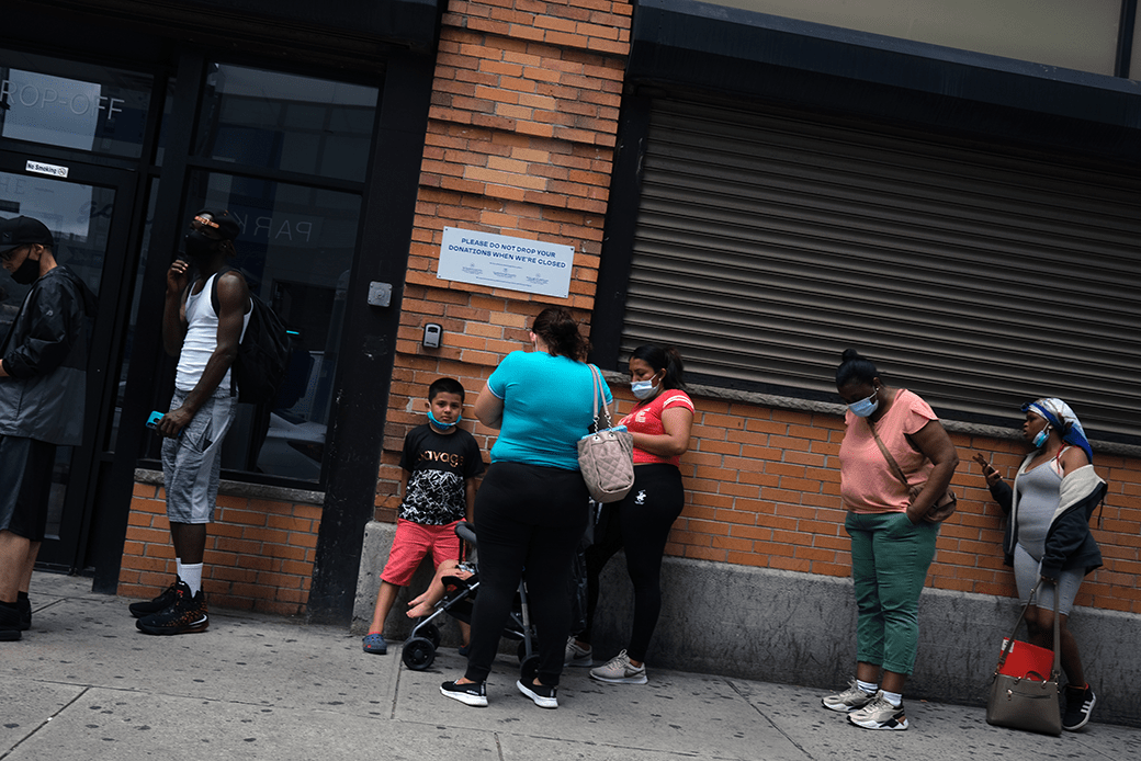 People wait in line for food assistance cards in Brooklyn, New York, July 2020. (Getty/Spencer Platt)