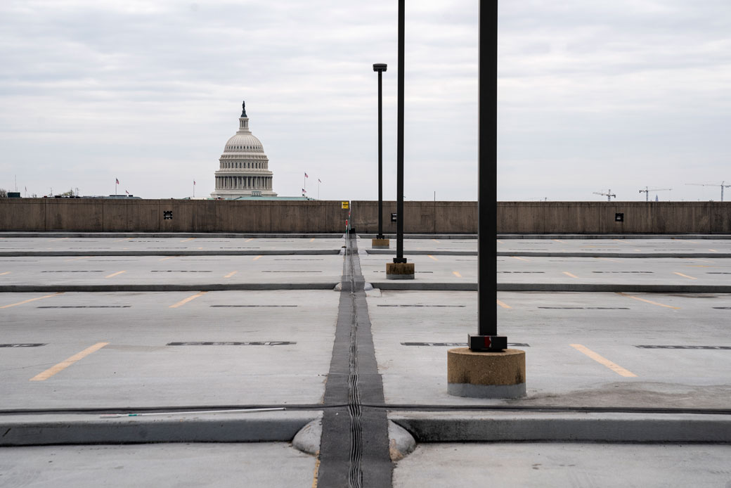  (The top level of a parking garage near the U.S. Capitol sits empty on March 18, 2020, in Washington, D.C.)