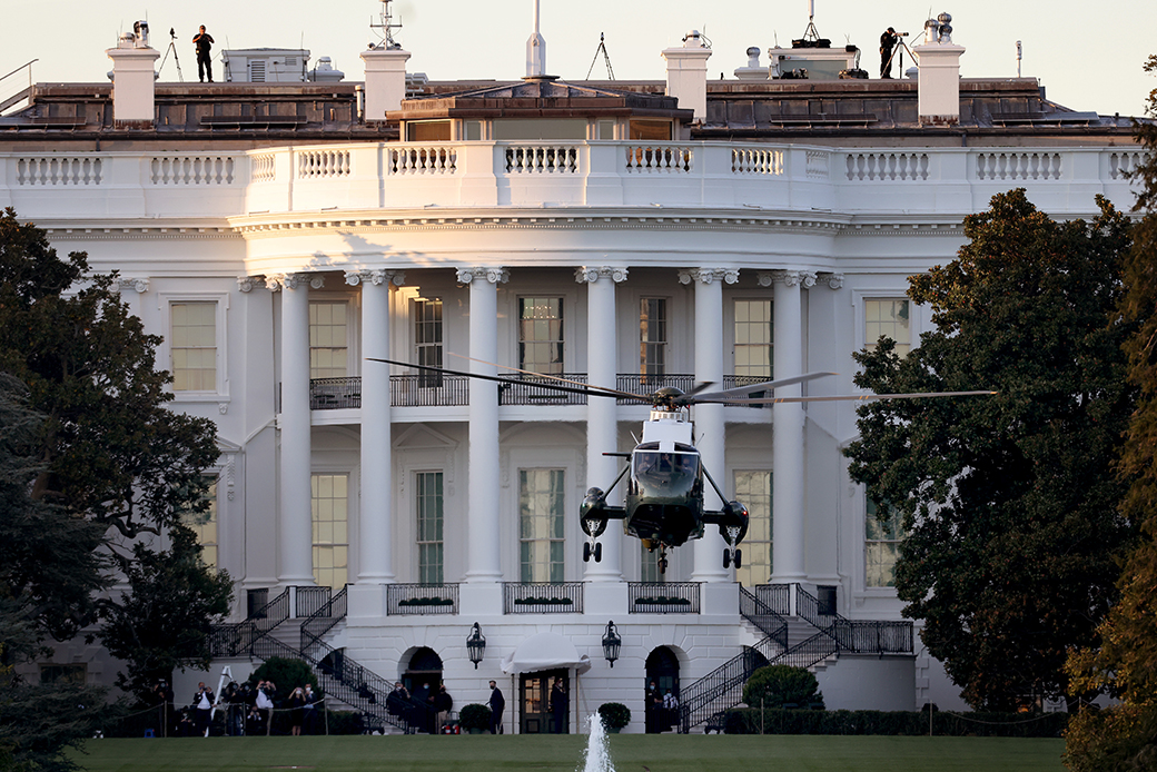Marine One, the presidential helicopter, carries President Donald Trump away from the White House on the way to Walter Reed National Military Medical Center, October 2, 2020, in Washington. (Getty/Win McNamee)