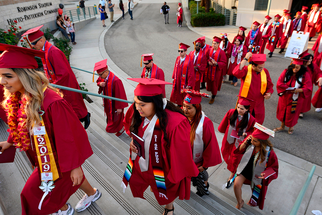Students earning degrees at Pasadena City College participate in the graduation ceremony in Pasadena, California, June 2019. (Getty/Robyn Beck/AFP)