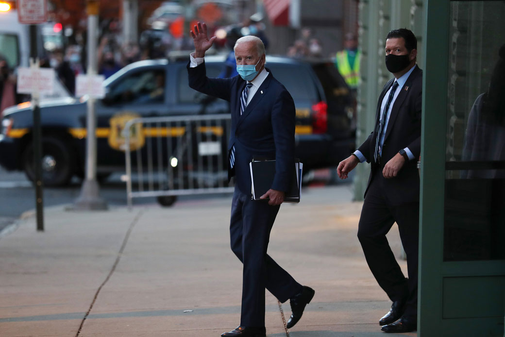 President-elect Joe Biden waves after addressing the media about the Trump administration's lawsuit to overturn the Affordable Care Act on November 10, 2020. (Getty/Joe Raedle)