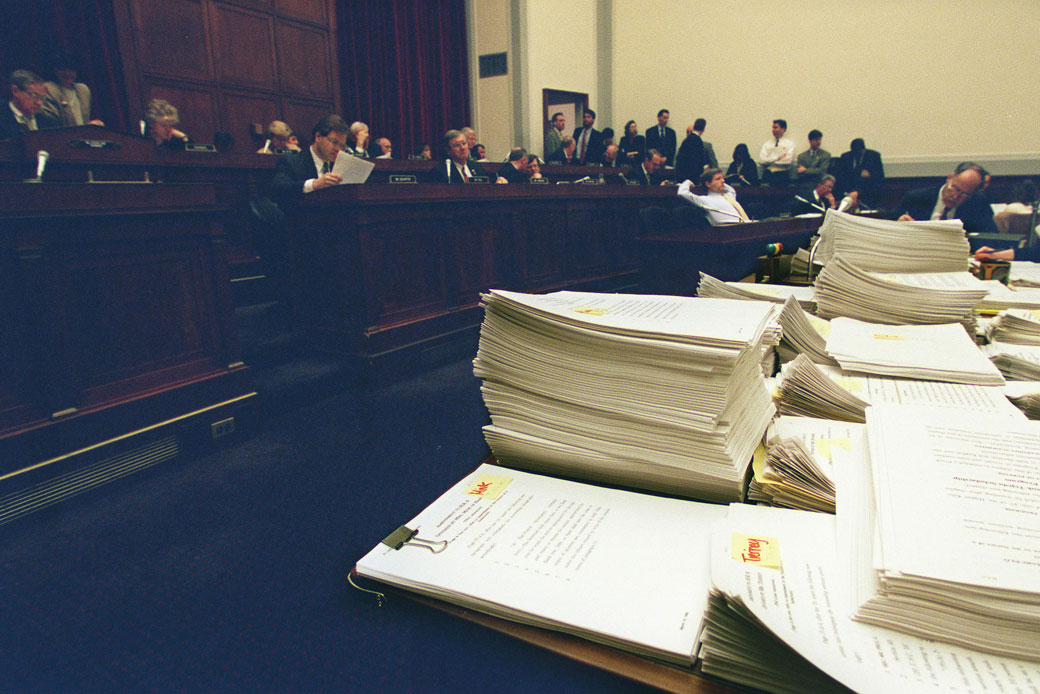 Amendments for H.R. 6 are stacked high during a House Education and Labor Committee markup of pending legislation, March 1998. (Getty/Congressional Quarterly/Douglas Graham)