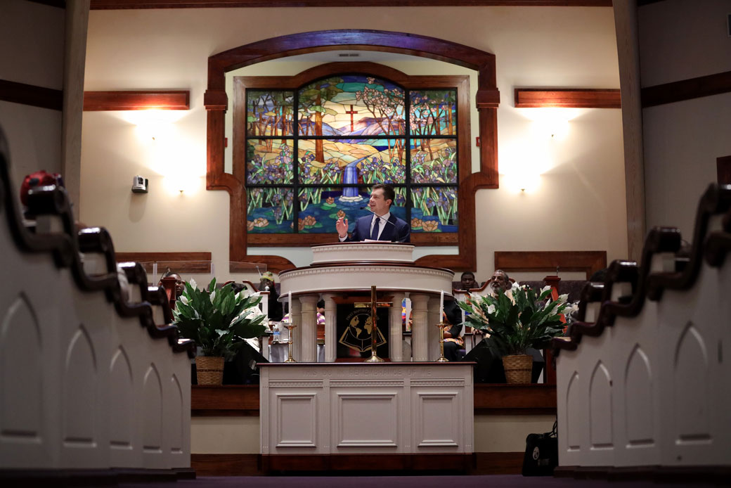 Then-Democratic presidential candidate and former South Bend, Indiana, Mayor Pete Buttigieg addresses a congregation while attending Sunday service at a church in Charleston, South Carolina, February 2020. (Getty/Win McNamee)