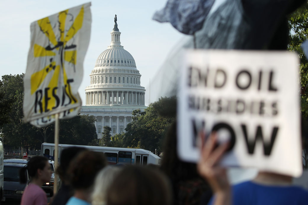  (Climate change protesters block traffic in front of the U.S. Capitol on September 23, 2019, in Washington, D.C.)