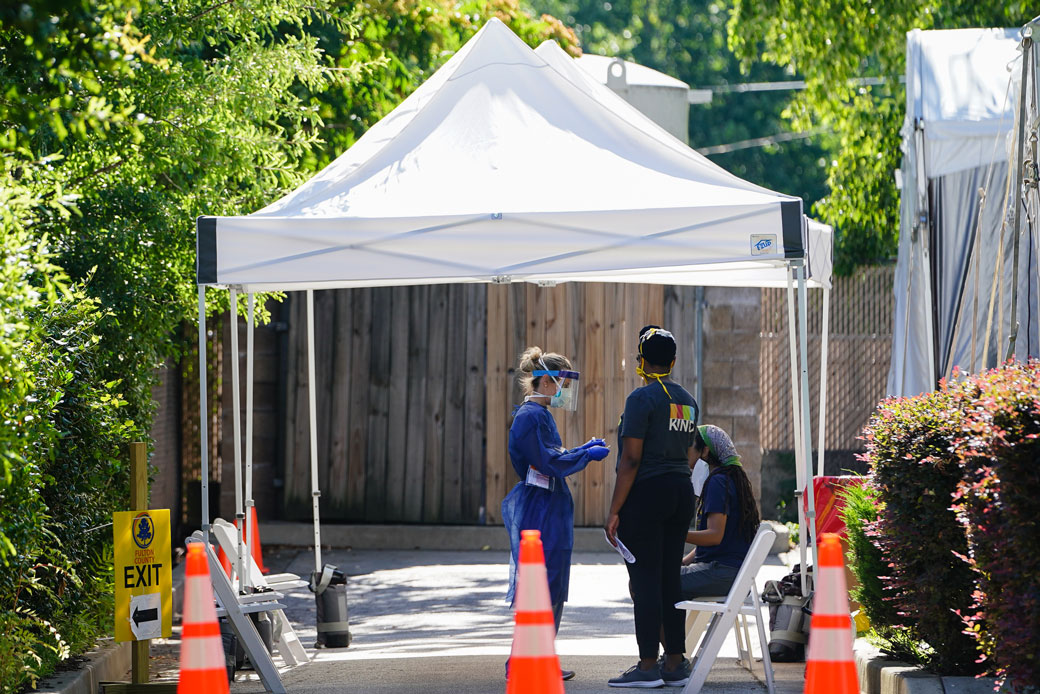 People get tested for COVID-19 at a free walk-up testing site on July 11, 2020, in Atlanta. (Getty/Elijah Nouvelage)