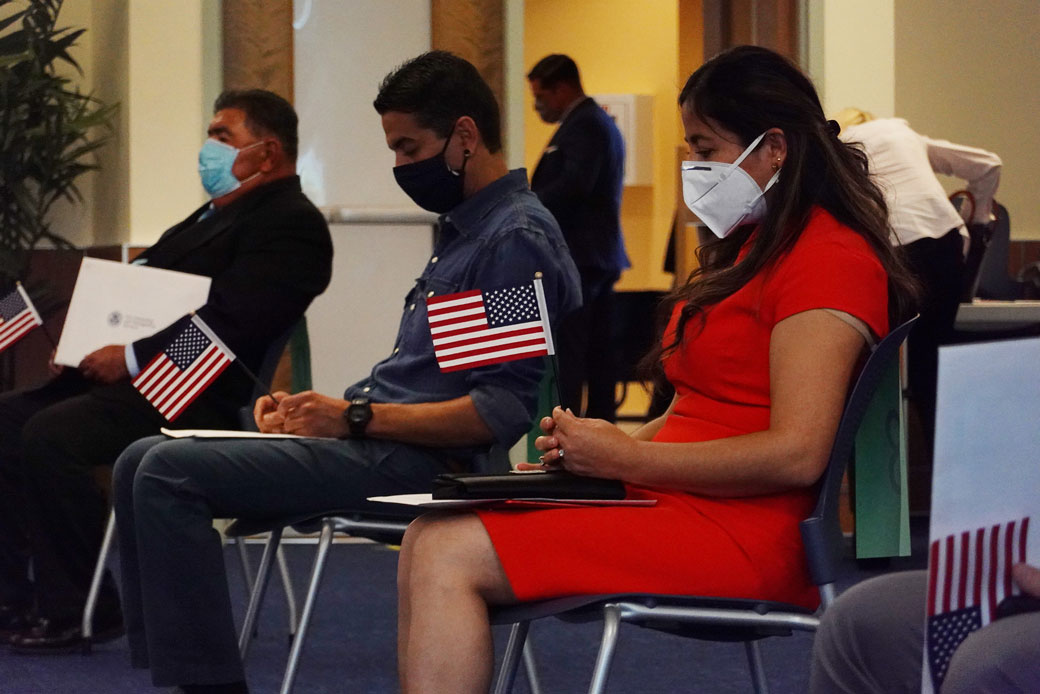 Giagnna Mendez, originally from Peru, participates in a swearing-in ceremony to become an American citizen on June 4, 2020, in Miami. (Getty/Joe Raedle)