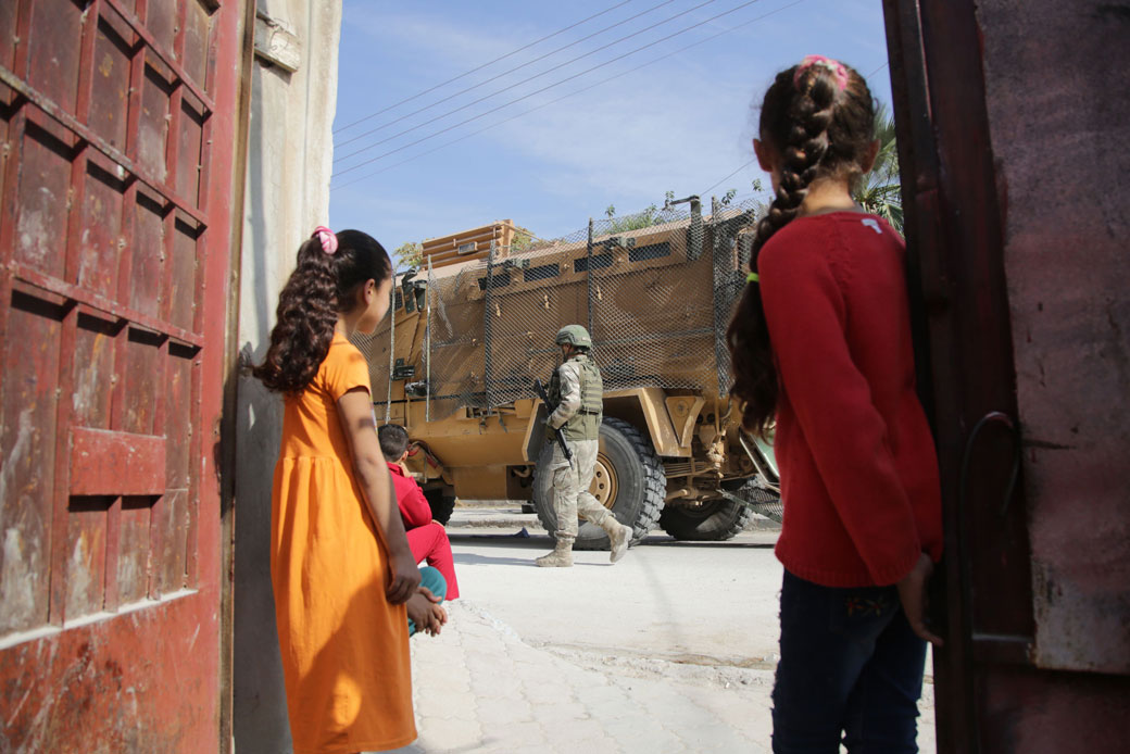 Turkish soldiers patrol the northern Syrian Kurdish town of Tel Abyad, on the border between Syria and Turkey, on October 23, 2019. (Getty/AFP/Bakr Alkasem)