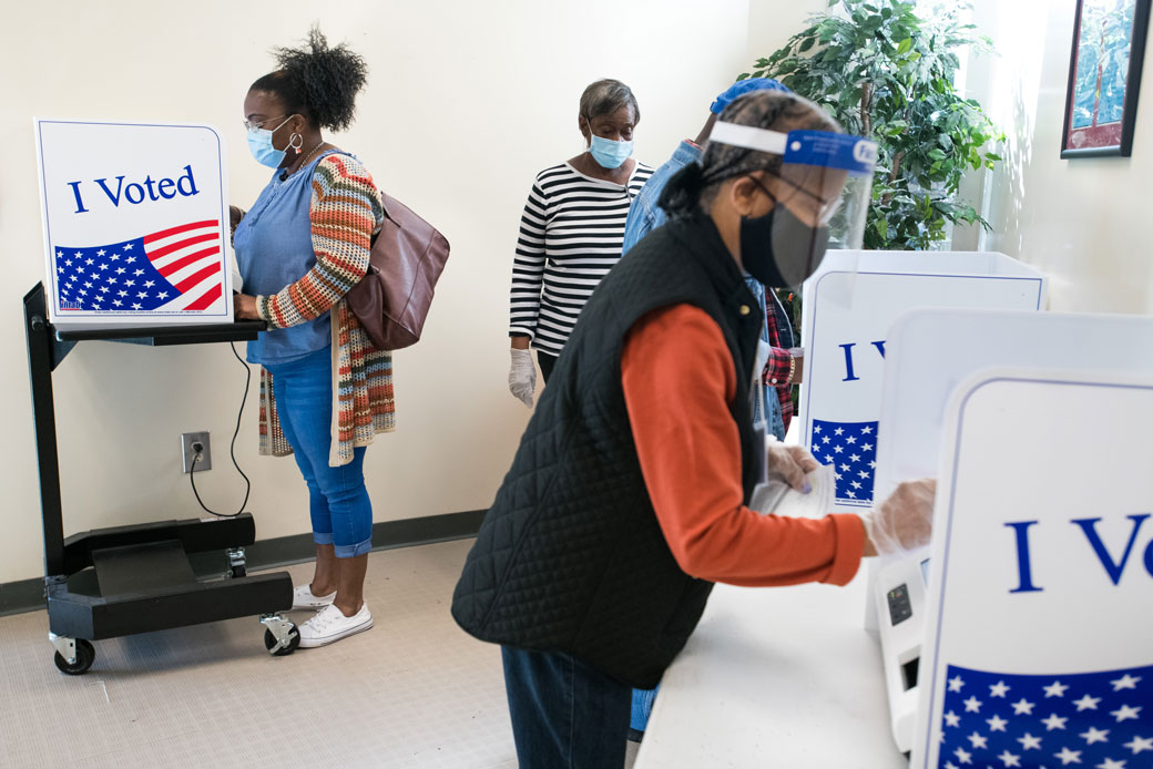 People cast votes on the second day of in-person absentee and early voting in Columbia, South Carolina, October 2020.