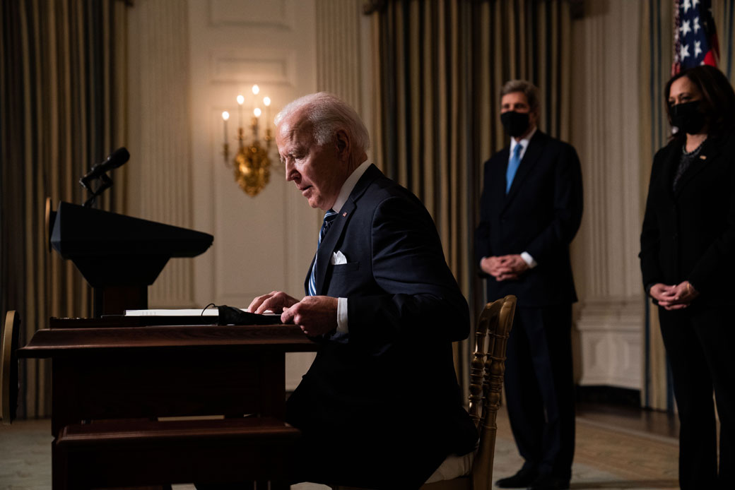(President Joe Biden prepares to sign executive orders after speaking about climate change issues at the White House on January 27, 2021, in Washington, D.C.)