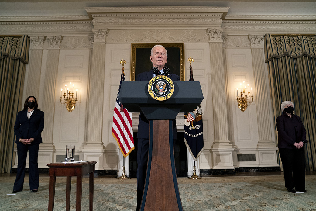 President Joe Biden delivers remarks on the national economy and the need for his administration's proposed coronavirus relief legislation in the State Dining Room at the White House, February 5, 2021. Also pictured: Vice President Kamala Harris and Treasury Secretary Janet Yellen. (Getty/Stefani Reynolds-Pool)
