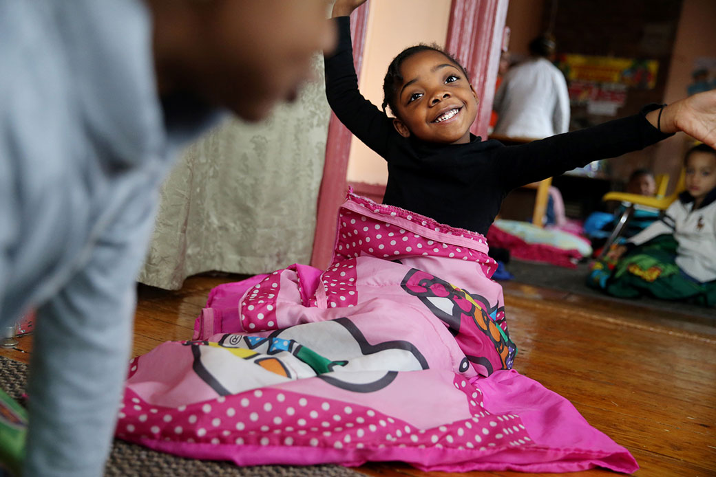  (A 4-year-old wakes from naptime at the preschool program at Paige Academy in Boston on January 27, 2017.)