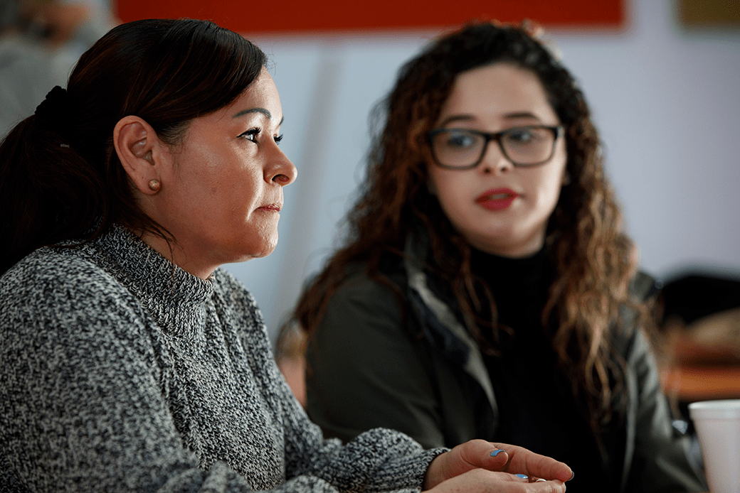 A U.S. citizen and her mother, a refugee from El Salvador protected under Temporary Protected Status (TPS), attend a legal clinic in Somerville, Massachusetts, January 2018. (Getty/Dina Rudick/The Boston Globe)