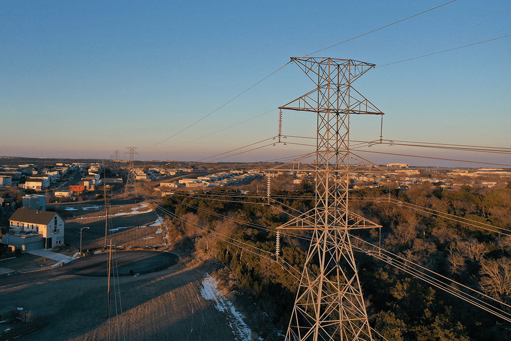 An aerial view shows electrical lines running through a neighborhood in Austin, Texas, on February 19, 2021. (Getty/Joe Raedle)