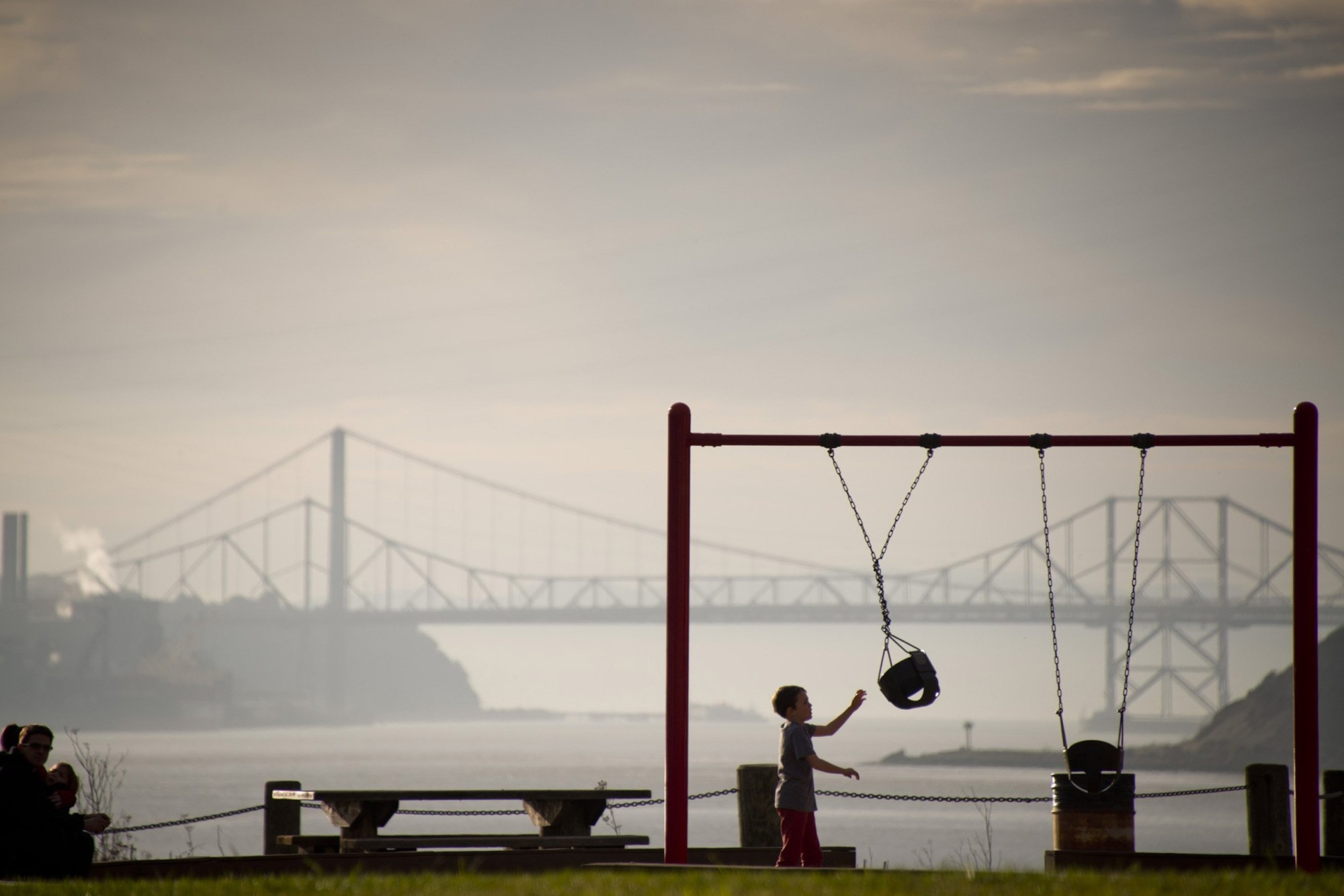 The Carquinez Bridge looms in the background of the playground area of the Ninth Street Park and Boat Launch in Benicia, Calif., Feb. 11, 2014. (Manny Crisostomo/Sacramento Bee/Tribune News Service via Getty Images)