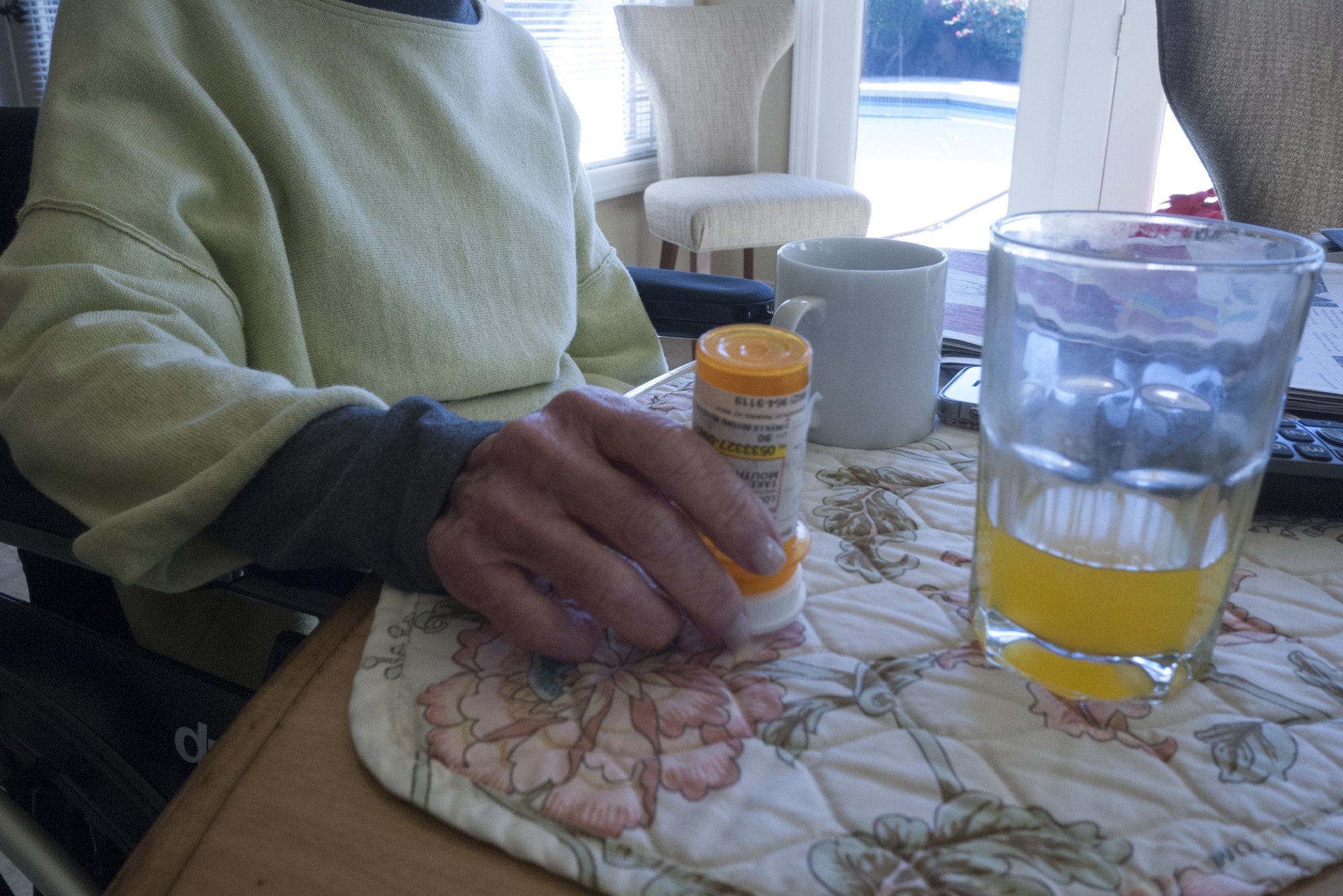 PHOENIX, AZ - DECEMBER 24: An elderly women begins her day taking her daily prescription medicine on December 24, 2017 in Phoenix, Arizona.(Photo by Andrew Lichtenstein/ Corbis via Getty Images)
