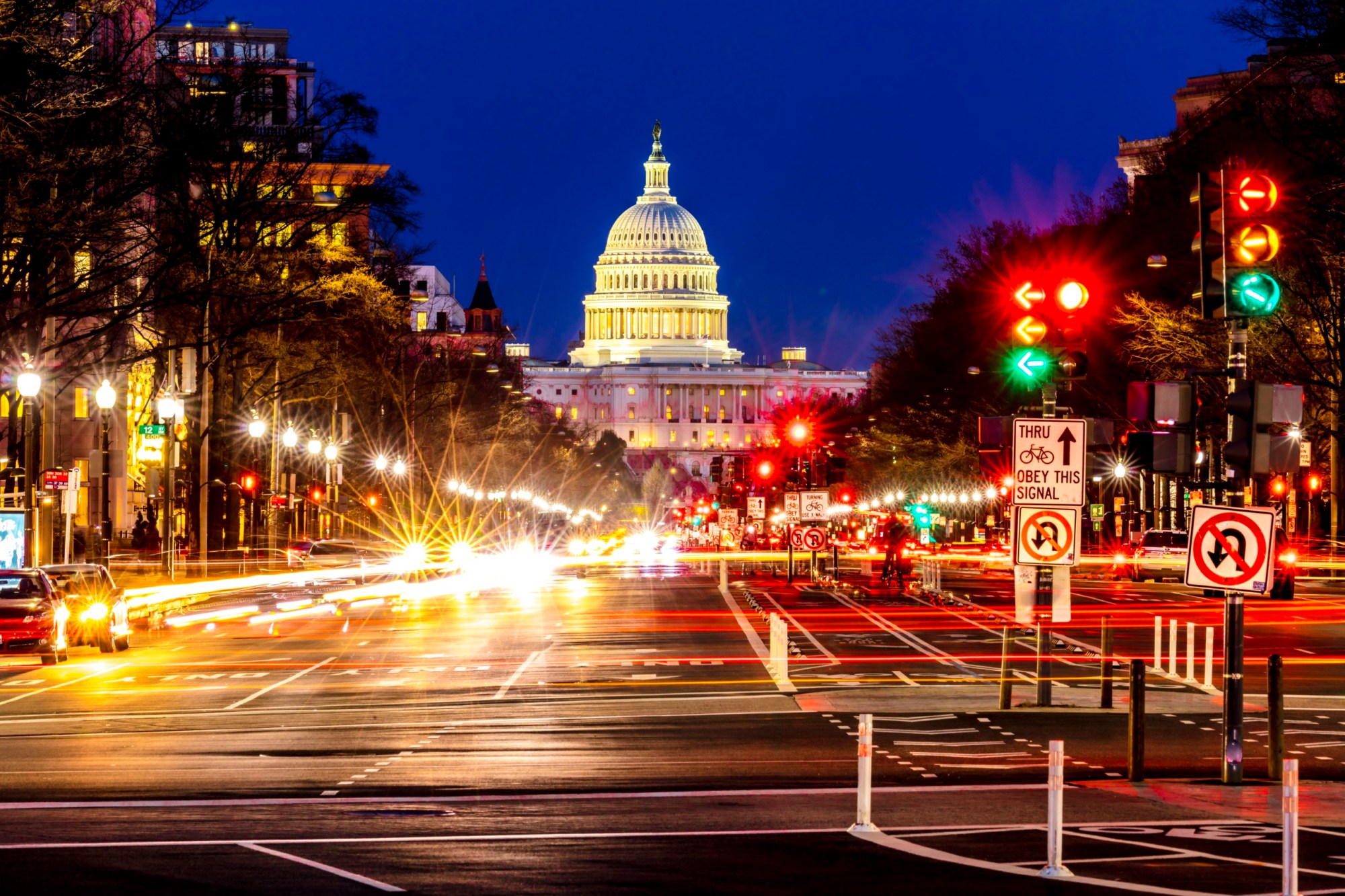 Cars with streaked headlights are seen on Pennsylvania Avenue going toward the U.S. Capitol during afternoon rush hour in Washington, D.C. (Getty/Visions of America/Universal Images Group)