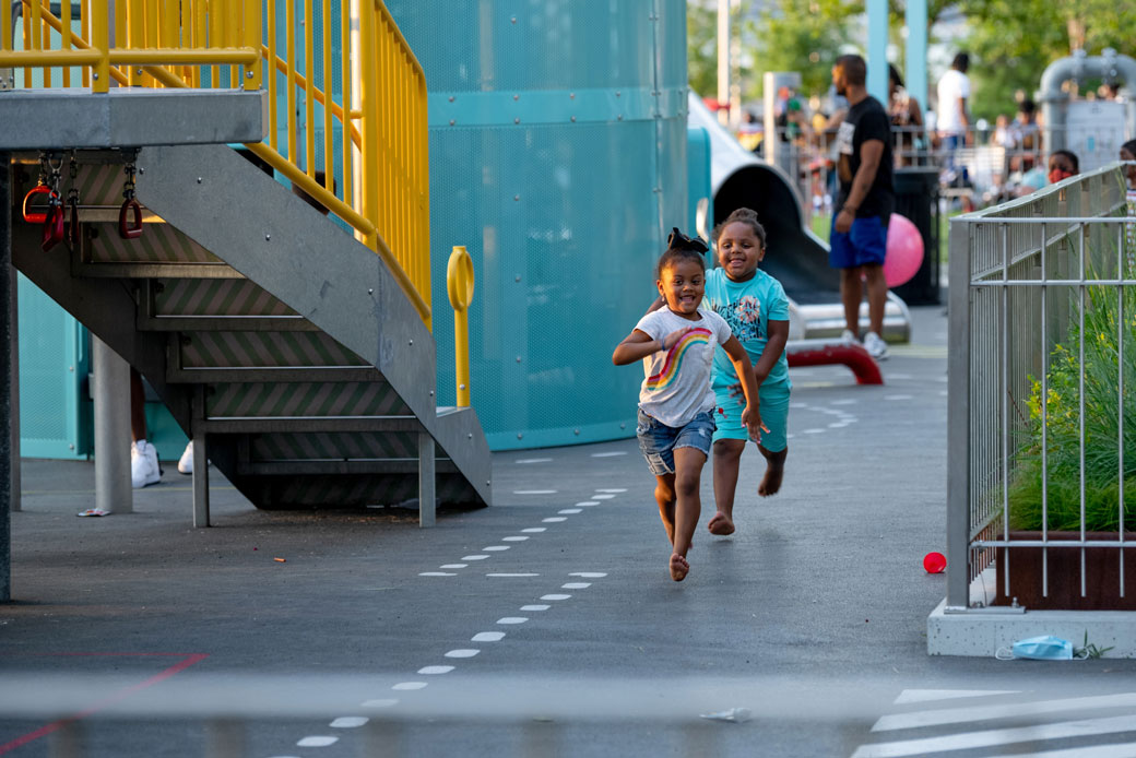 Children run through Domino Park as New York City continues Phase 4 of reopening following restrictions imposed to slow the spread of COVID-19, July 2020. (Getty/Alexi Rosenfeld)