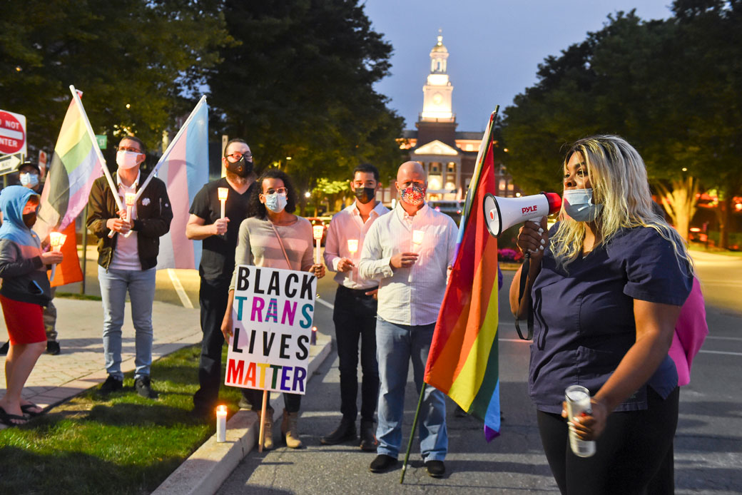 People holding signs supporting Black transgender people gather during a candlelight vigil in West Reading, Pennsylvania, on September 14, 2020. (Getty/Ben Hasty/MediaNews Group/Reading Eagle)