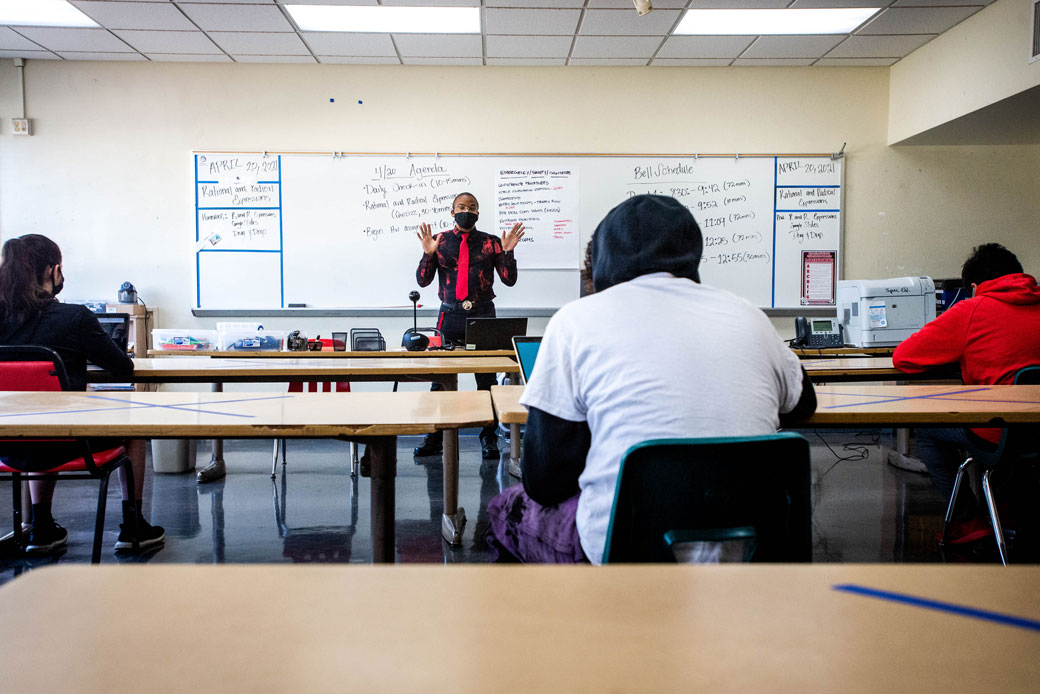  (An educator teaches integrated math at a high school in Pasadena, California, April 2021.)