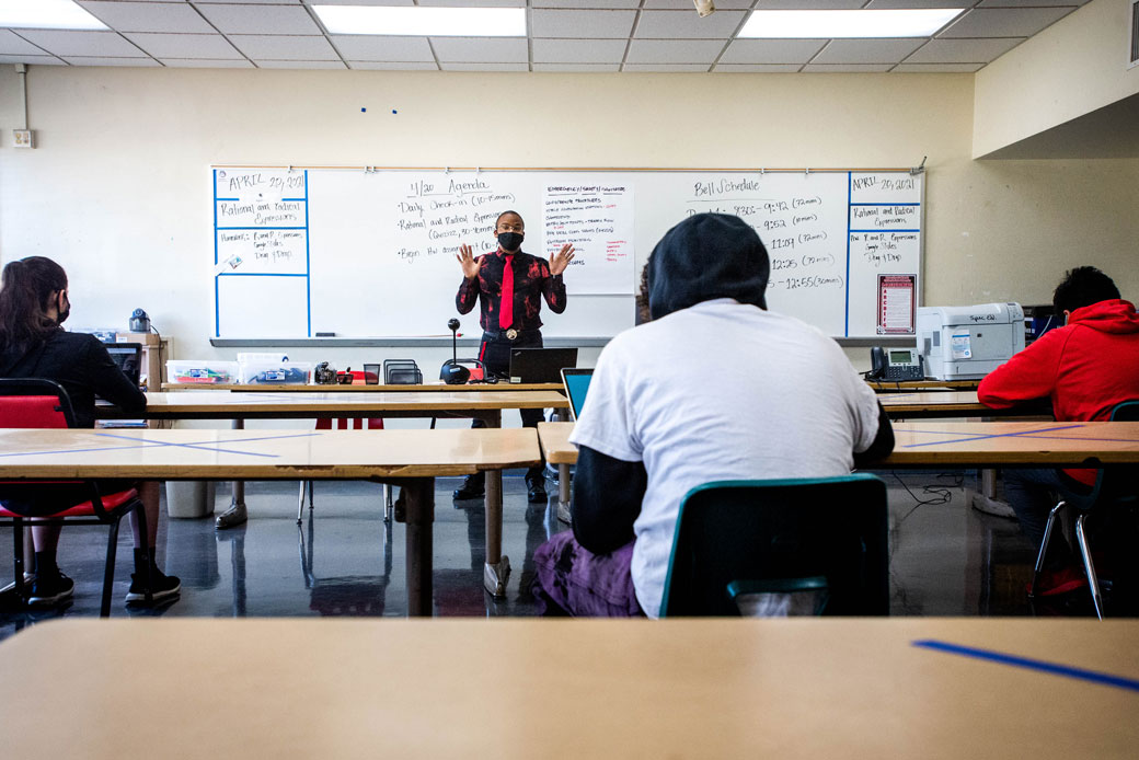 (An educator teaches integrated math at a high school in Pasadena, California, April 2021.)