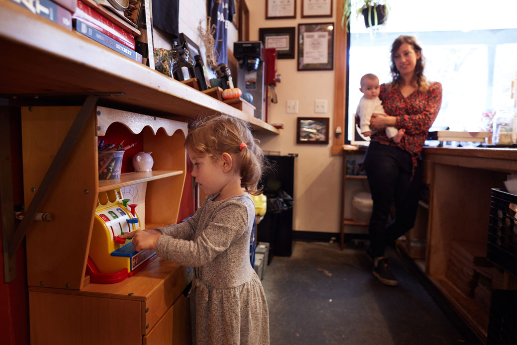 A mother spends time with her two daughters at the family's shop in Capon Springs, West Virginia, October 2019. (Getty/The Washington Post/Deb Lindsey)