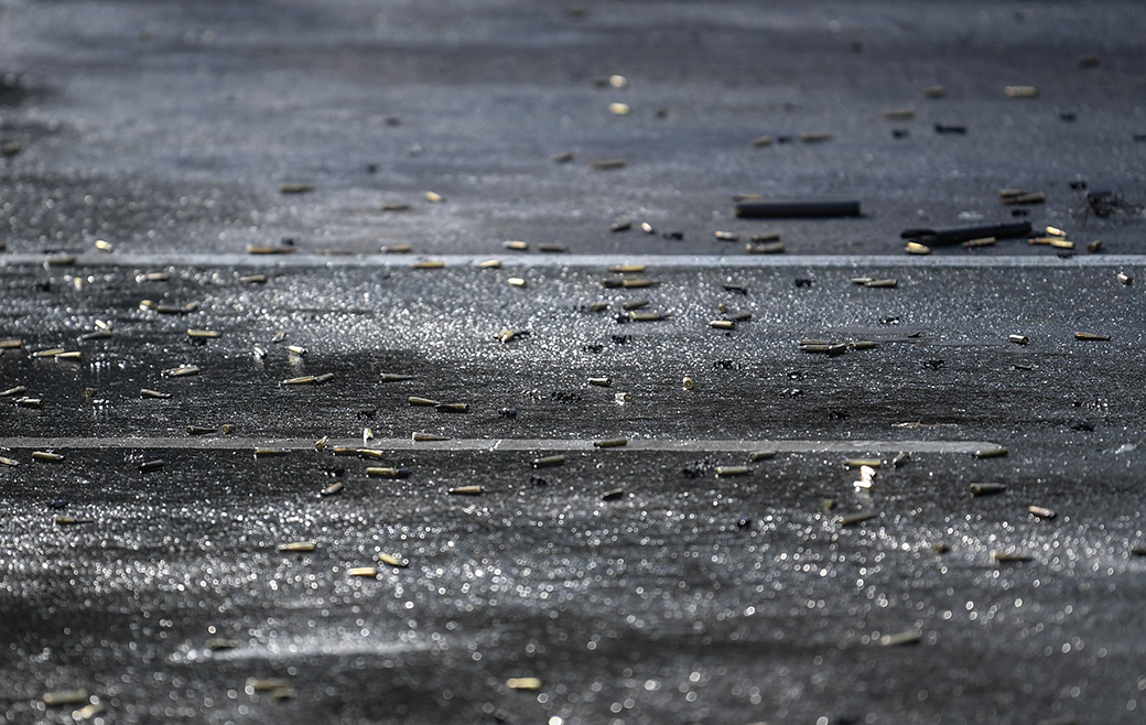 Bullet casings are seen on the ground at the crime scene after Mexico City's Public Security Secretary Omar García Harfuch was wounded in an attack in Mexico City, June 26, 2020. (Getty/Pedro Pardo/AFP)