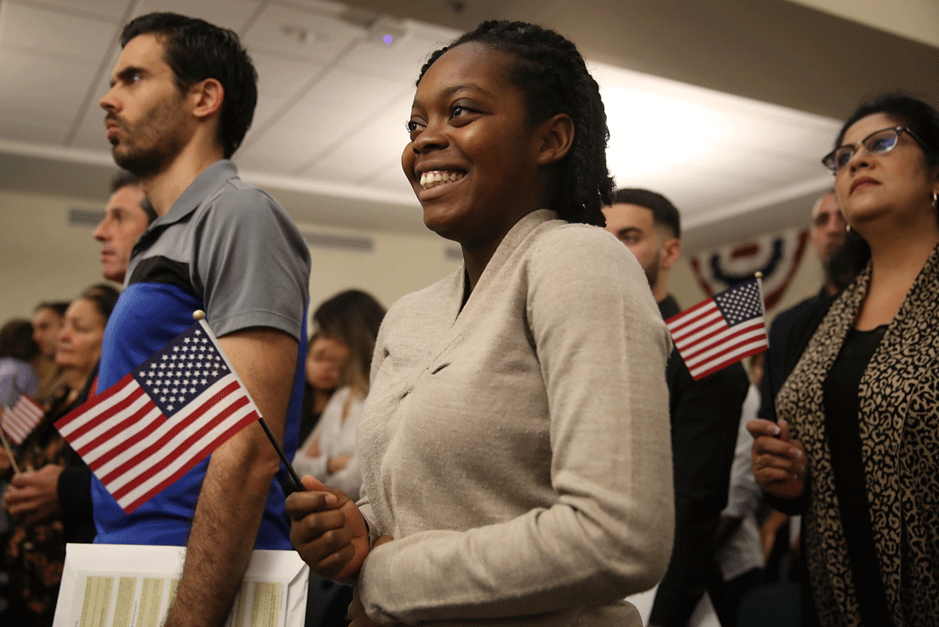 A Haitian immigrant becomes a U.S. citizen during a naturalization ceremony in Hialeah, Florida, on January 12, 2018. (Getty/Joe Raedle)