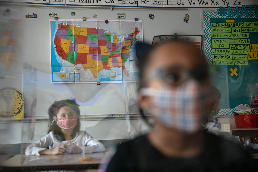 Third grade students take part in class at Julia A. Stark Elementary School in Stamford, Connecticut, on March 10, 2021.