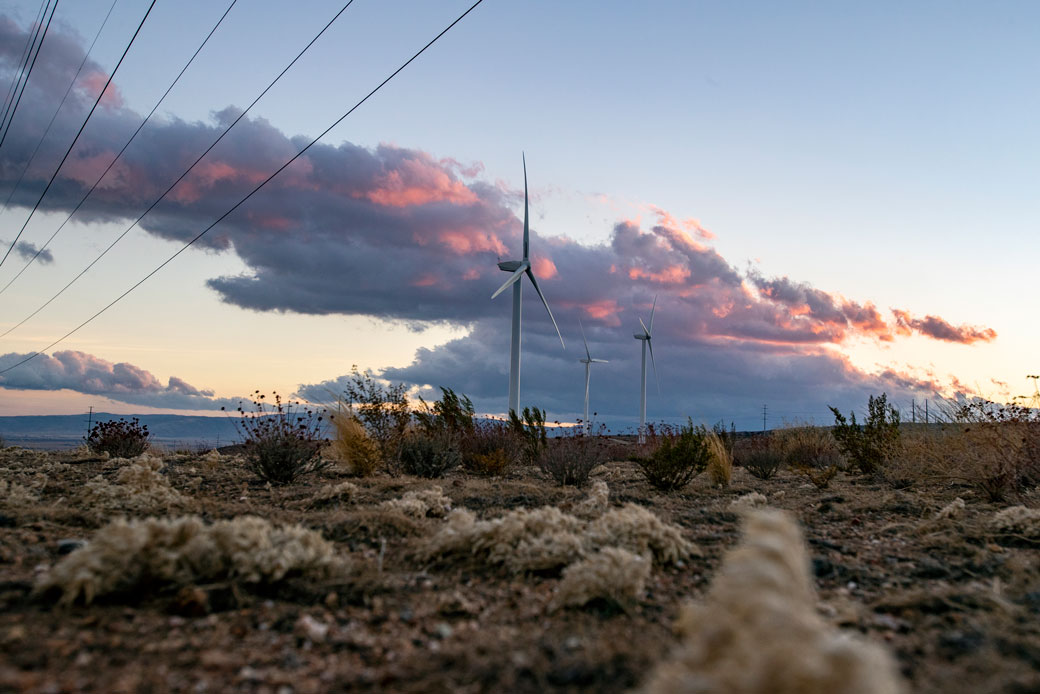 Dusk settles over wind turbines in the Tehachapi Mountains on February 16, 2021, in Rosamond, California. (Getty/Los Angeles Times/Gina Ferazzi)