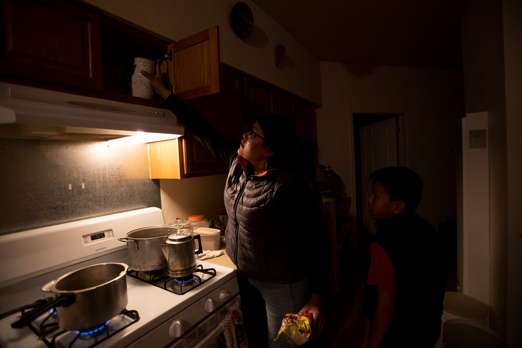  (A mother and her 10-year-old son live without electricity or running water on a Navajo Nation reservation in Cameron, Arizona, during the coronavirus pandemic, March 2020.)