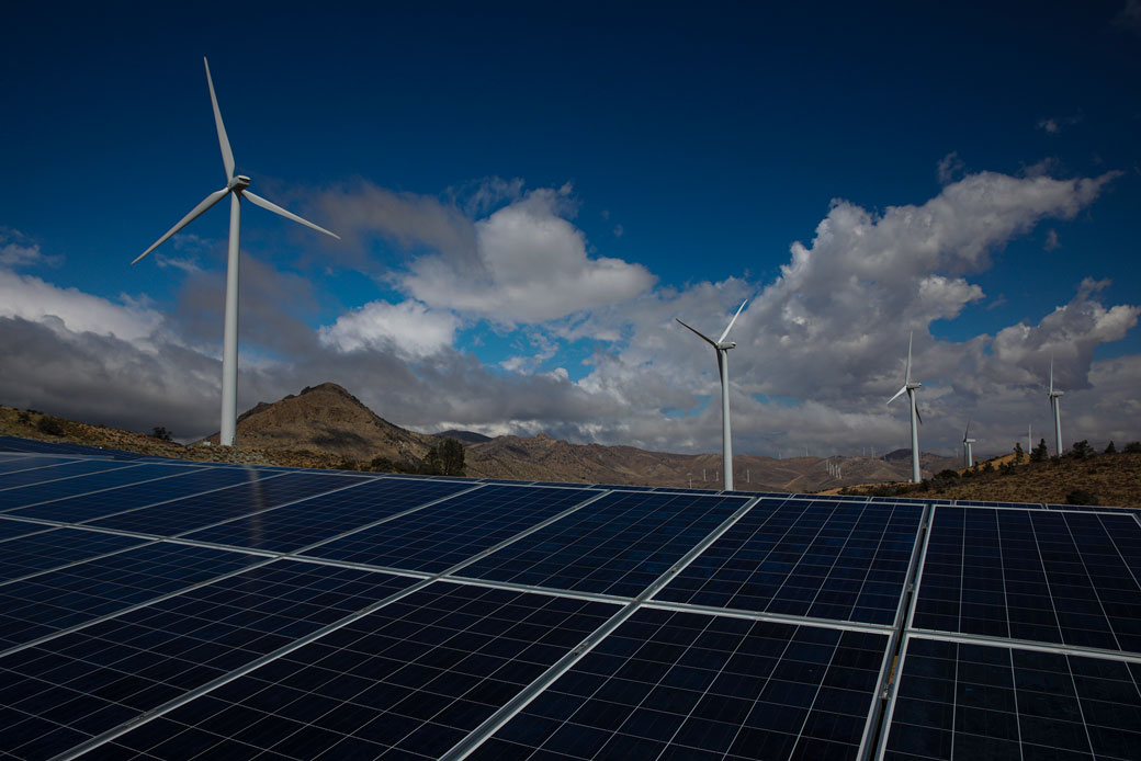  (A wind farm and solar power plant are nestled among the Tehachapi Mountains in Kern County, California, March 2021.)
