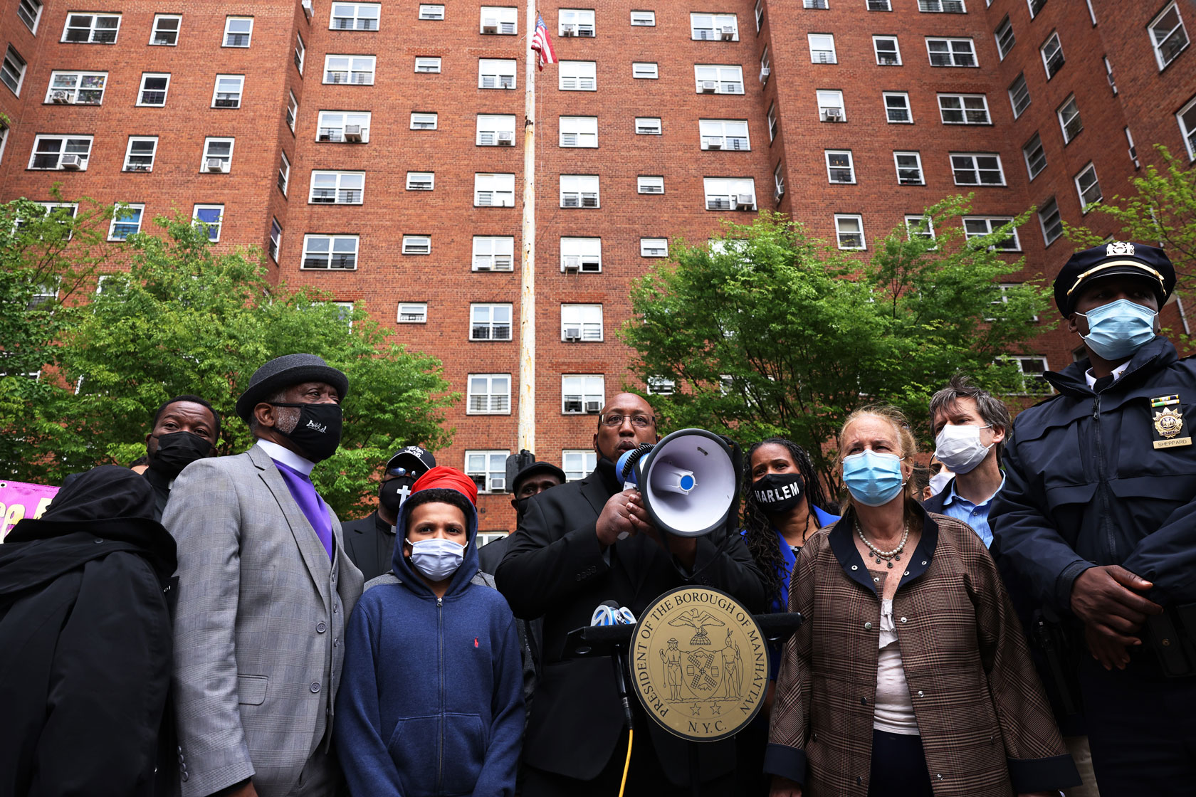 Chaplain speaks after Harlem peace walk.