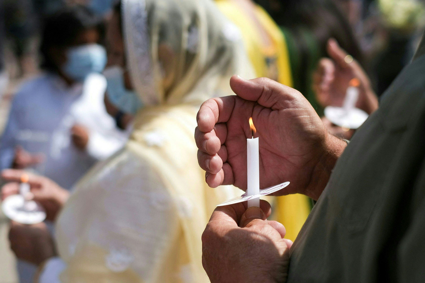 Community members attend a candlelight vigil in Indianapolis.