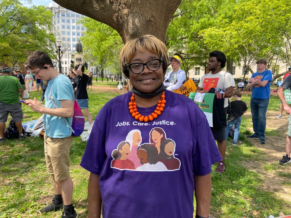 Diane Holmes wears a shirt with the words: 