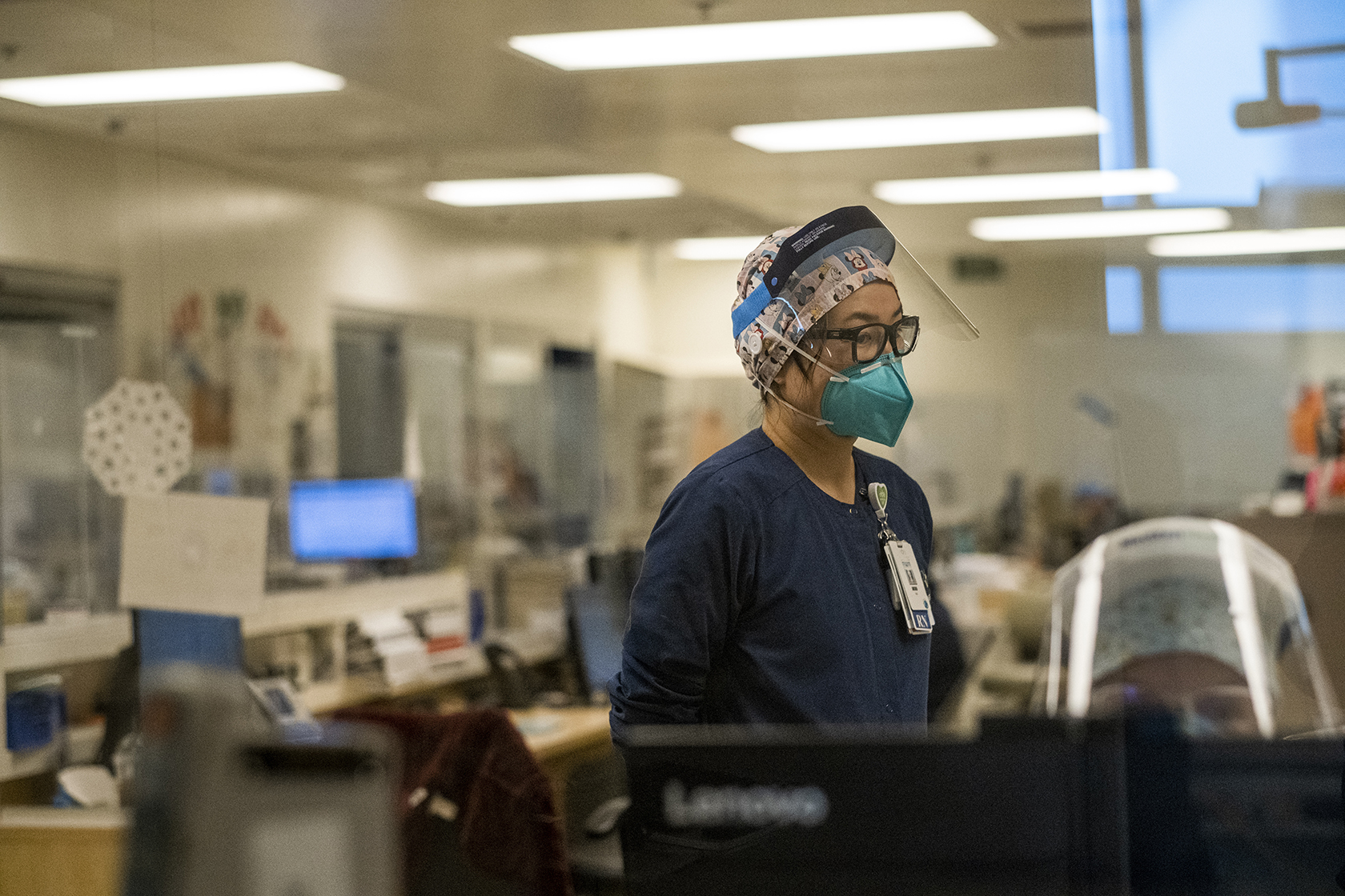 Nurse wearing a face shield and mask