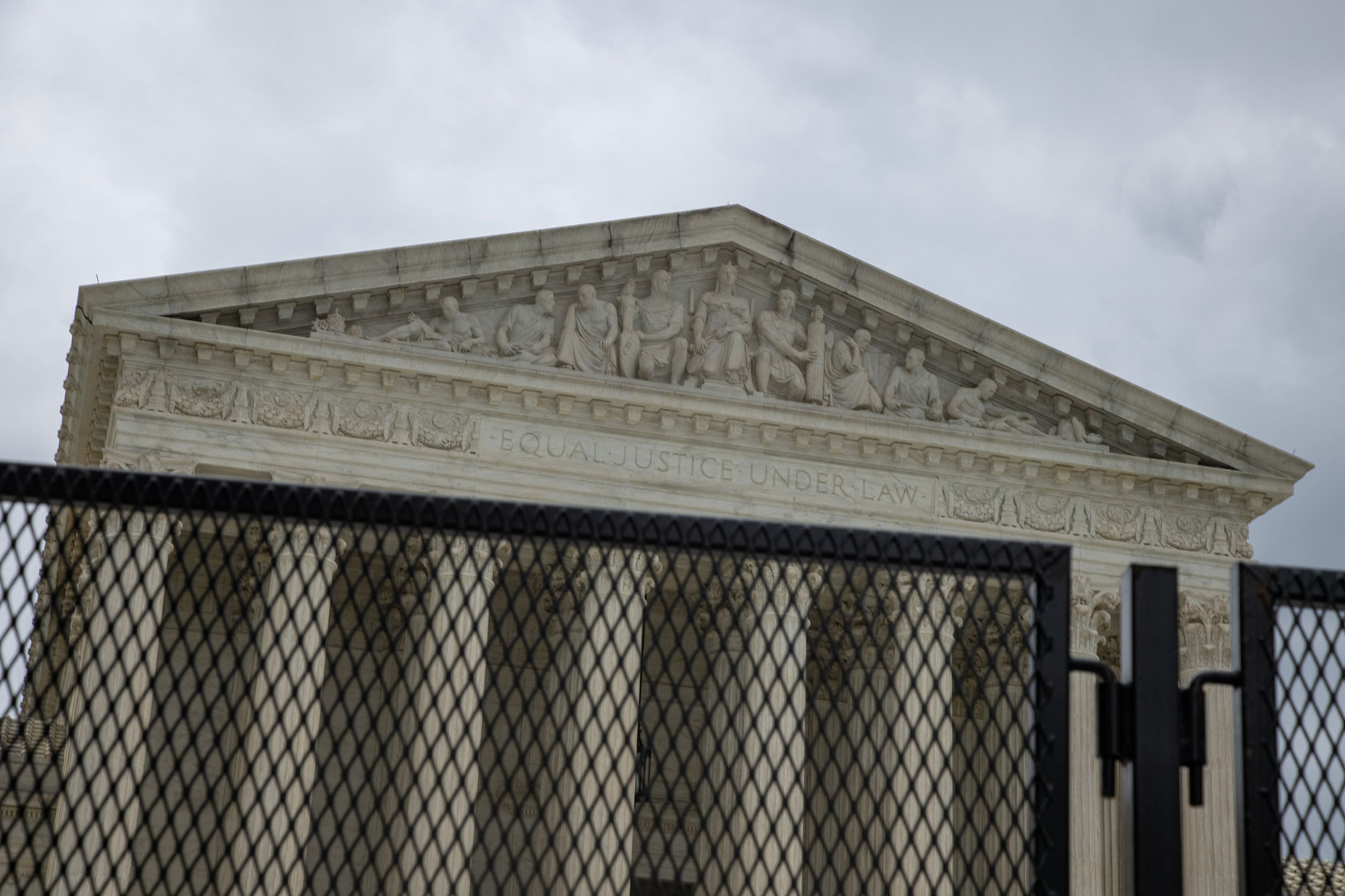 The Supreme Court in Washington, D.C. is seen behind fencing.