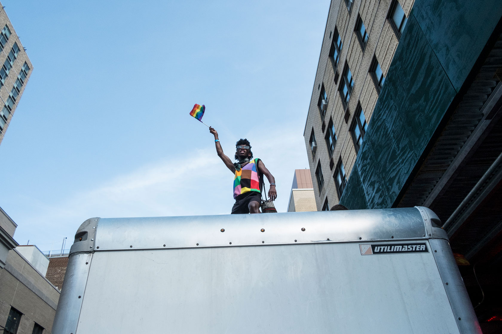 A person holding a Pride flag participates in New York City's Pride celebration in 2021.