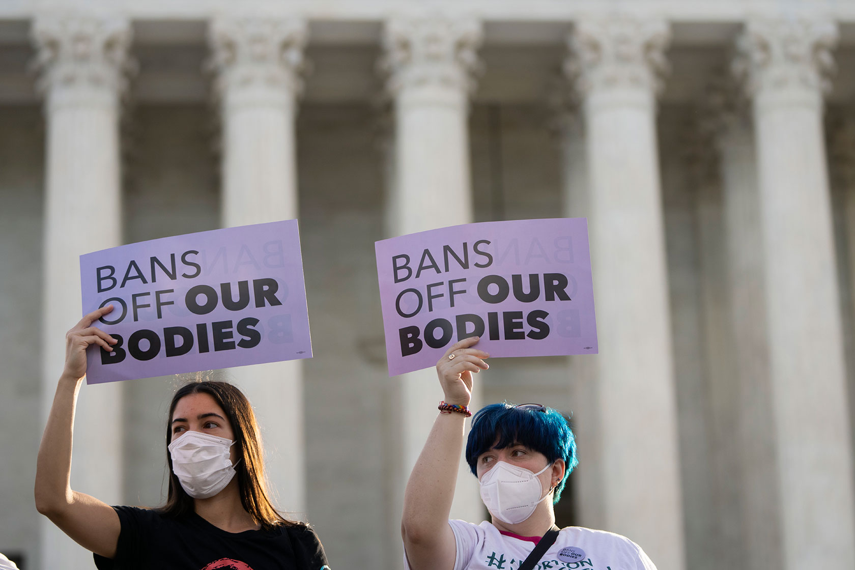 Reproductive health advocates rally outside the U.S. Supreme Court.