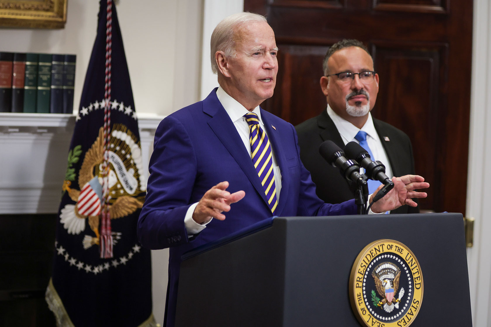 U.S. President Joe Biden, joined by Education Secretary Miguel Cardona, speaks on student loan debt.