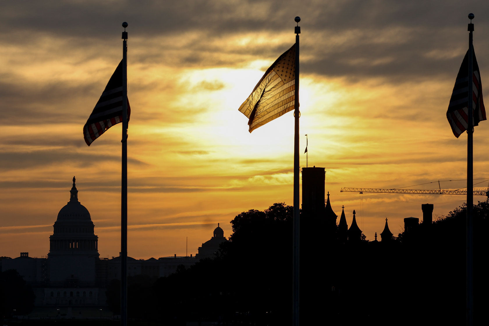 The sun rises over the U.S. Capitol.