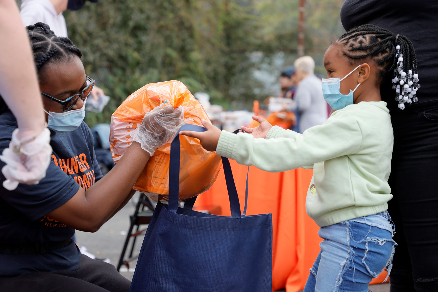 Staten Island residents receive food and other items on September 30, 2021.