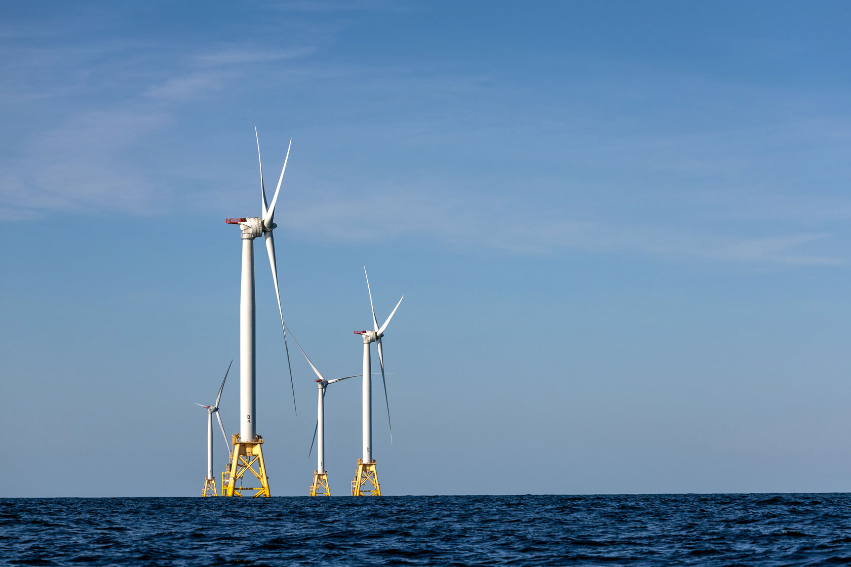 Photo shows offshore wind turbines.