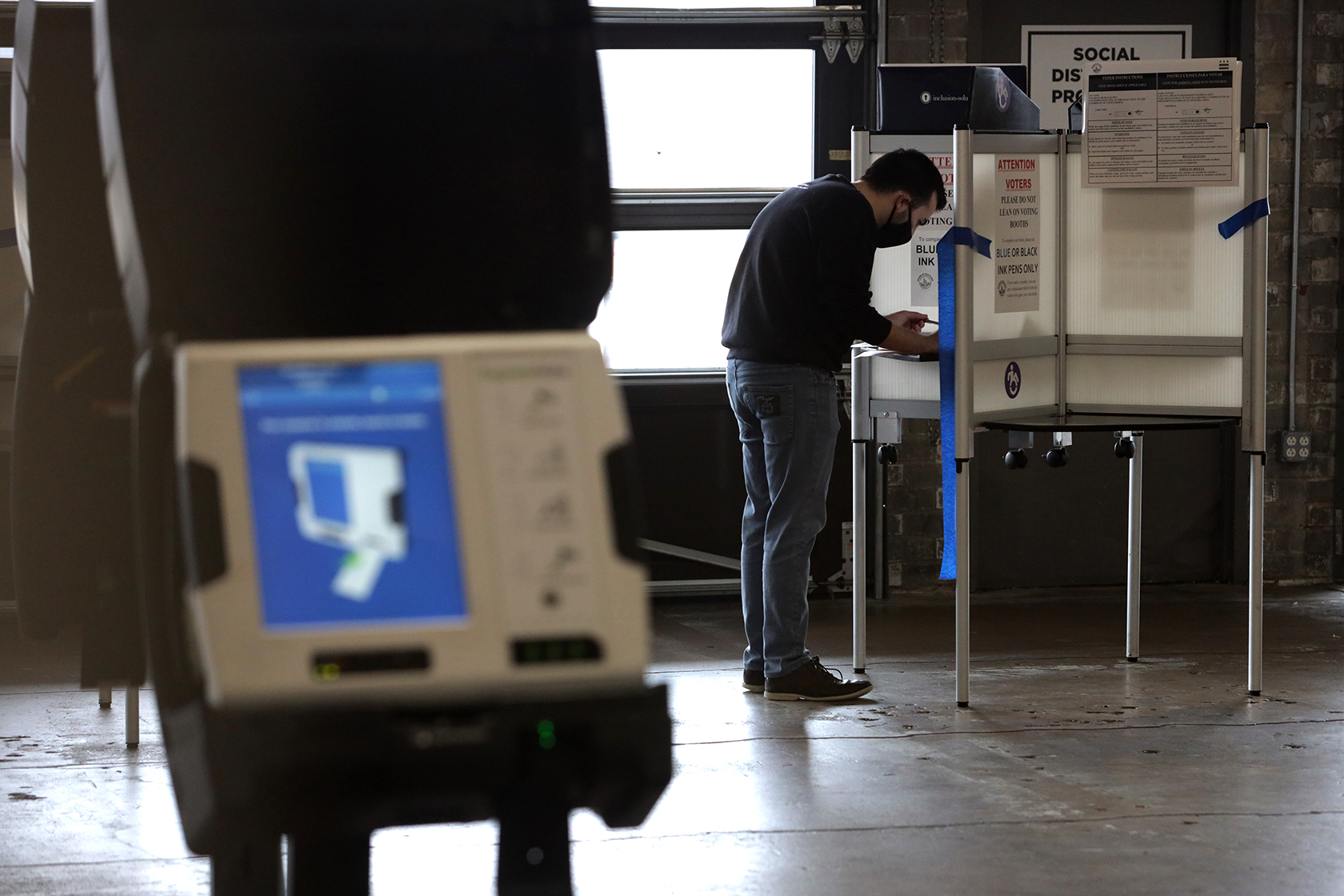 Person standing at voting station