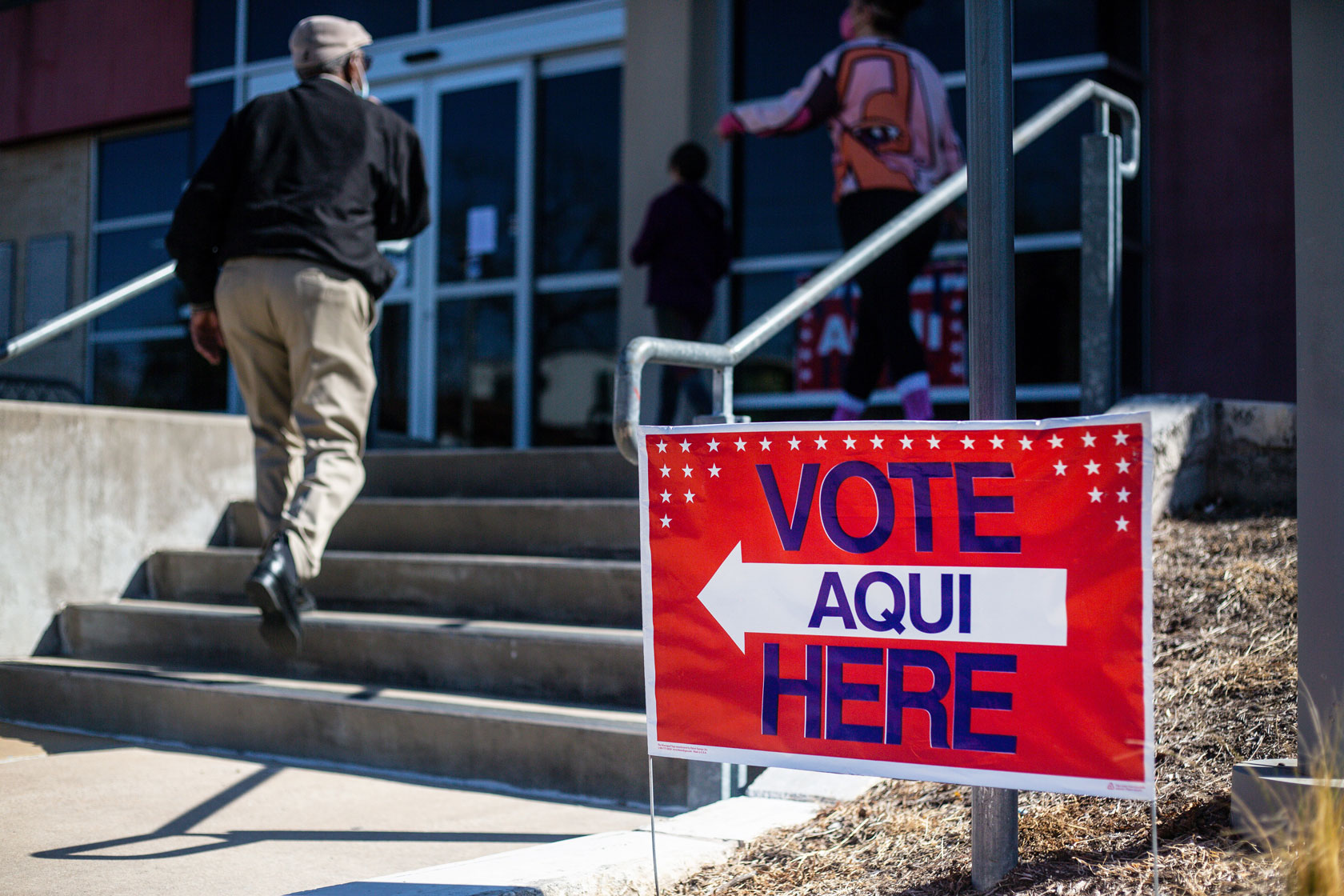 People vote at the Carver Branch Library in Austin, Texas.