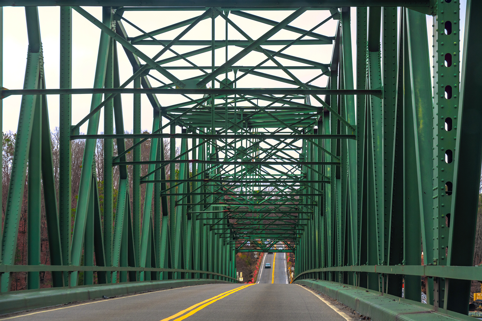 ATLANTA, GEORGIA, UNITED STATES - 2018/12/21: Pattern on an old metallic bridge seen on a rural road in the State of Georgia, United States. The built structure is painted in green. (Photo by Roberto Machado Noa/LightRocket via Getty Images)