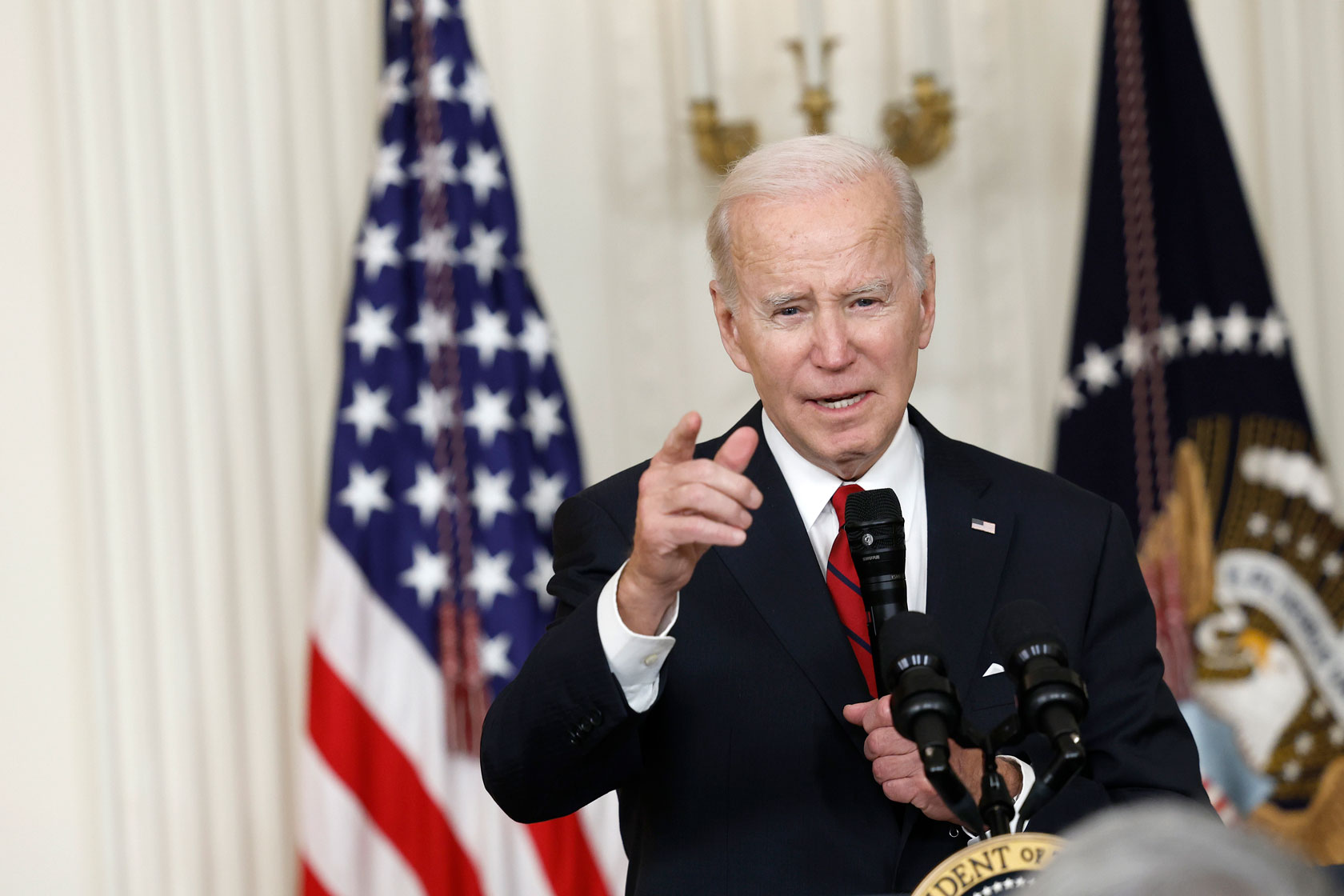 Biden speaking at podium