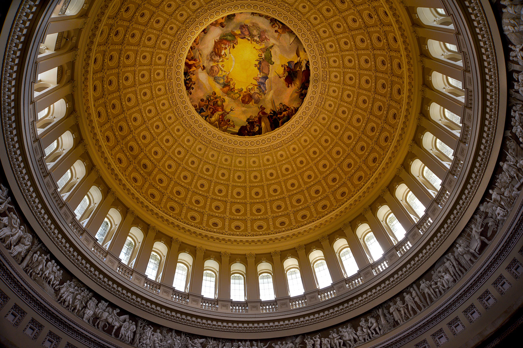 Photo shows the inner dome of the U.S. Capitol building.