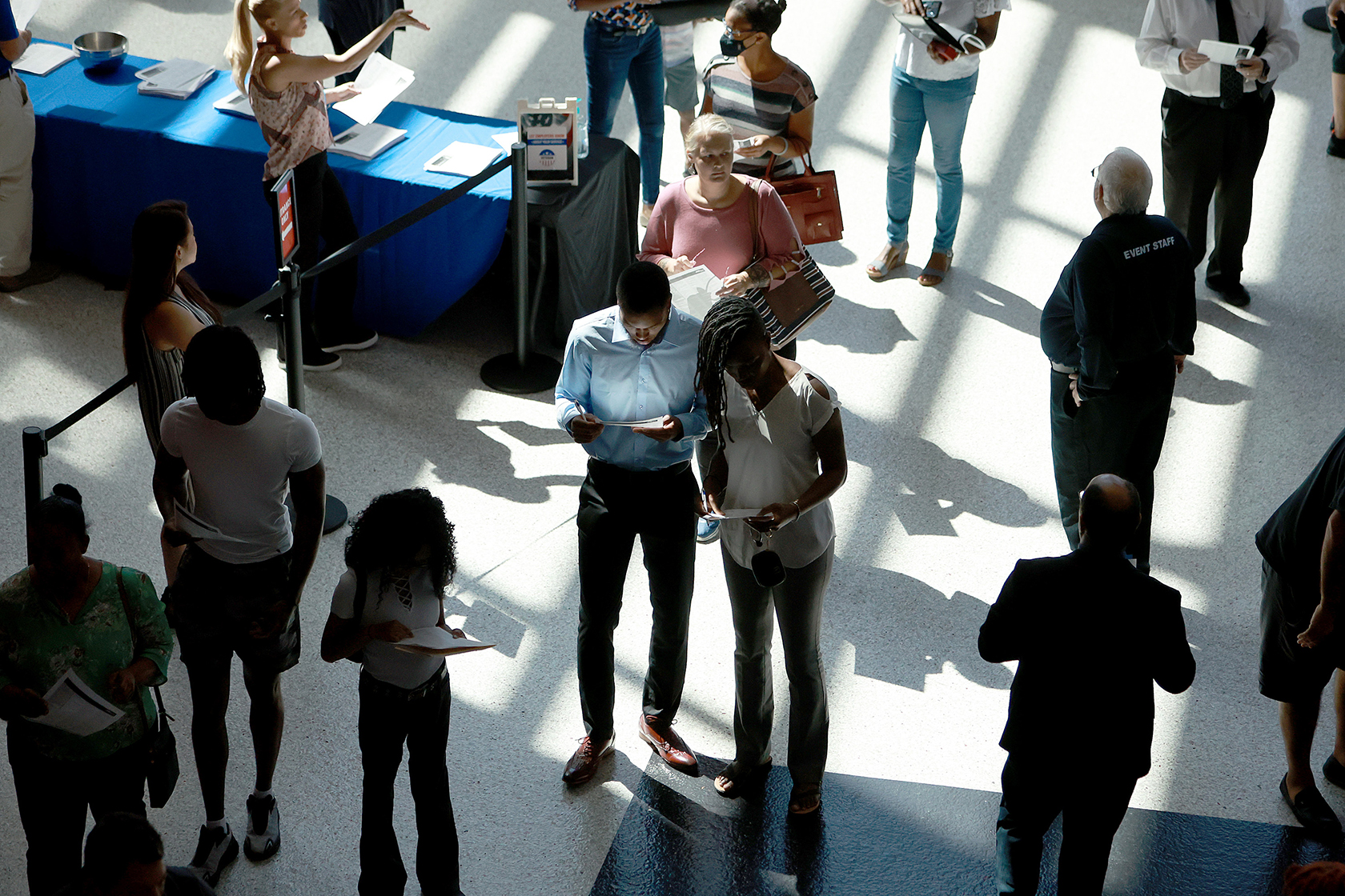 Wide shot of people at job fair