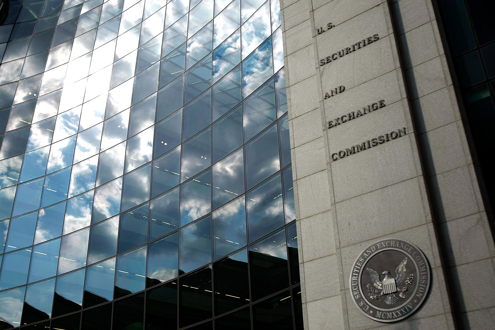 The U.S. Securities and Exchange Commission seal hangs on the facade of its building.