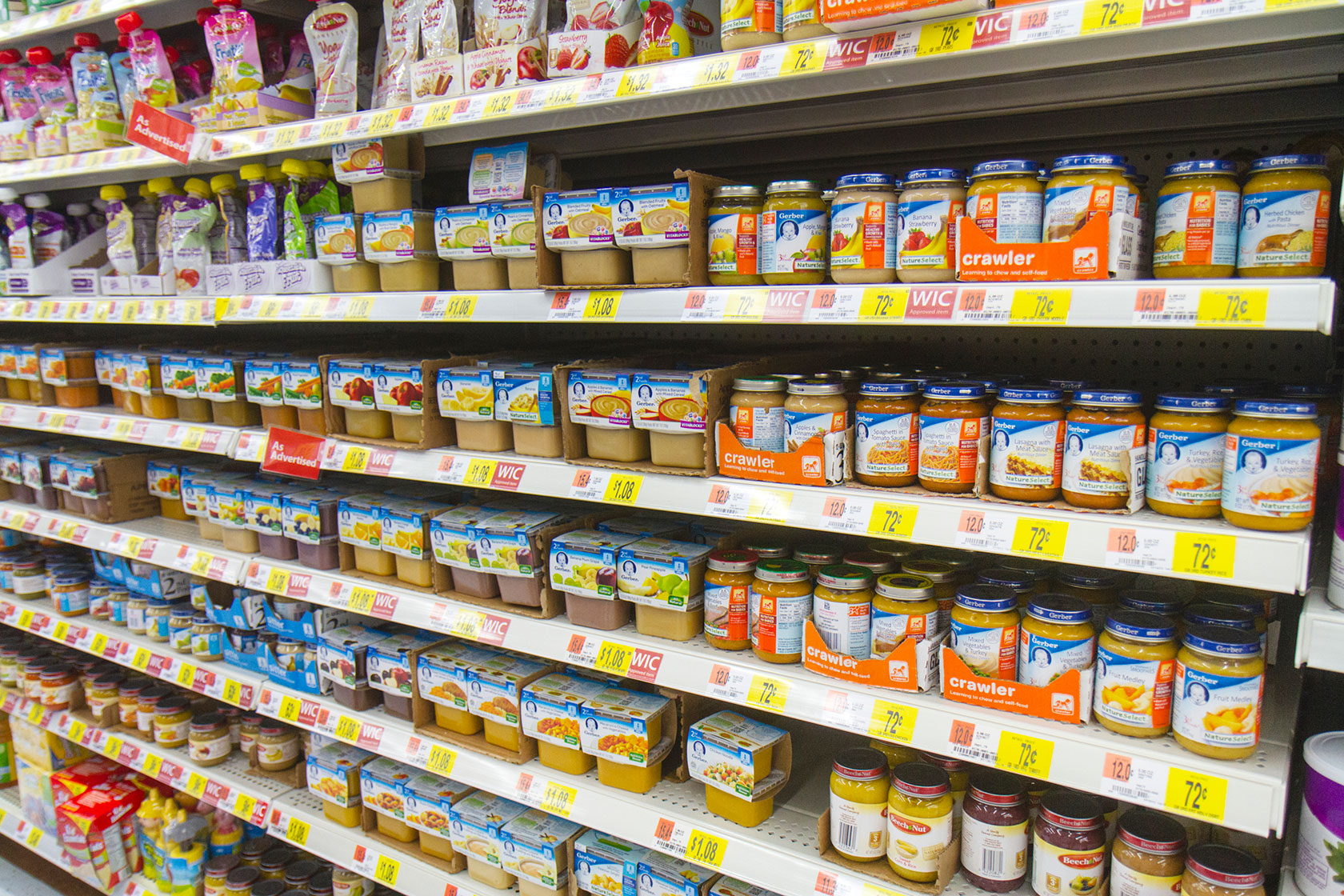 Photo shows shelves of baby food products.